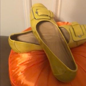 Yellow patent shoes